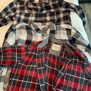 Men’s size Large flannel long sleeve shirts.